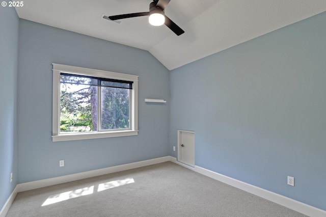 850 NW 114th Ave, Portland, OR 97229 - empty room featuring ceiling fan, vaulted ceiling, carpet flooring, and baseboards