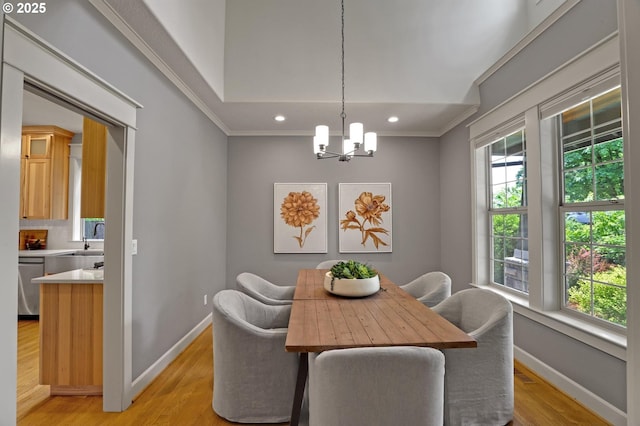850 NW 114th Ave, Portland, OR 97229 - dining room featuring baseboards, light wood-type flooring, a chandelier, crown molding, and recessed lighting