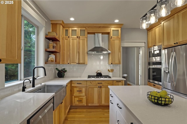 850 NW 114th Ave, Portland, OR 97229 - kitchen featuring wall chimney range hood, stainless steel appliances, a sink, light countertops, and decorative backsplash