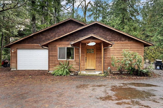 chalet / cabin featuring driveway