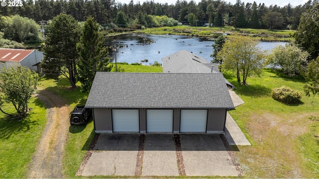 54601 Winterberry Dr, Bandon, OR 97411 - view of subject property featuring a large body of water and a heavily wooded area