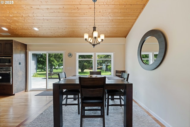 54601 Winterberry Dr, Bandon, OR 97411 - dining room featuring wood ceiling, healthy amount of natural light, light wood-type flooring, a chandelier, and recessed lighting