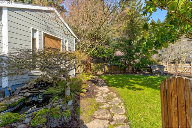 view of yard featuring fence