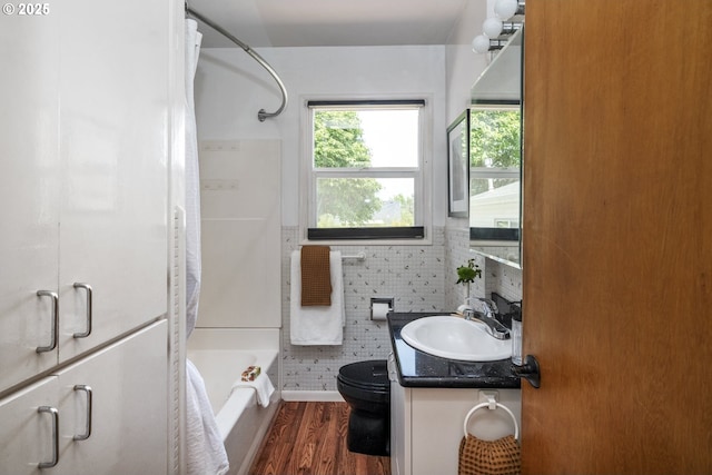 8735 NE Alberta St, Portland, OR 97220 - bathroom featuring vanity, wood finished floors, and shower / tub combo with curtain