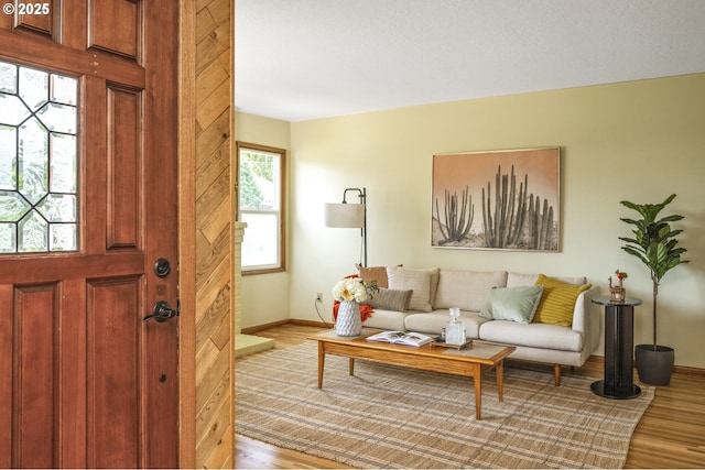 8735 NE Alberta St, Portland, OR 97220 - living room featuring wood finished floors and plenty of natural light