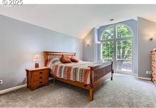 bedroom featuring access to exterior, baseboards, carpet floors, and vaulted ceiling