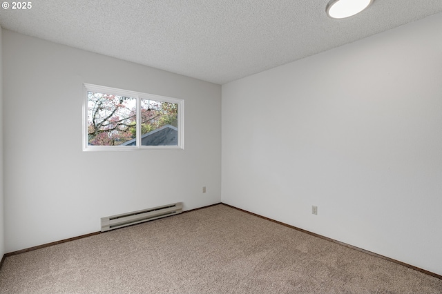 10915 SW Meadowbrook Dr Unit 22, Portland, OR 97224 - carpeted spare room featuring baseboard heating and a textured ceiling
