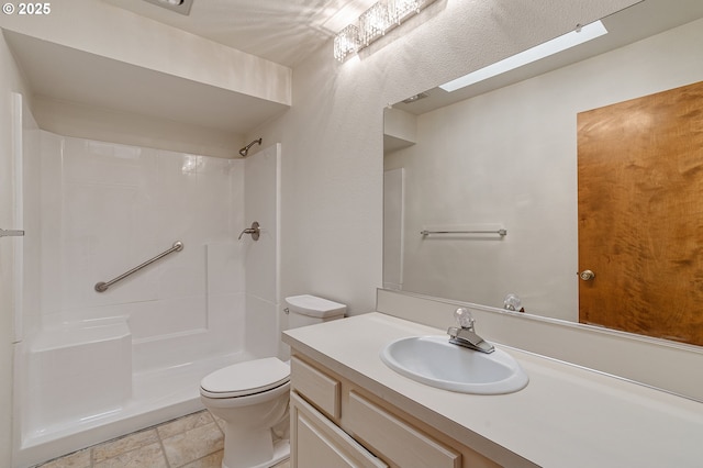 10915 SW Meadowbrook Dr Unit 22, Portland, OR 97224 - full bath featuring vanity, a shower, and stone finish flooring