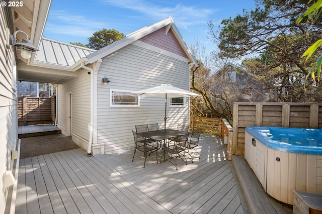 8917 Spindrift Ln, Manzanita, OR 97130 - deck featuring a hot tub and outdoor dining space