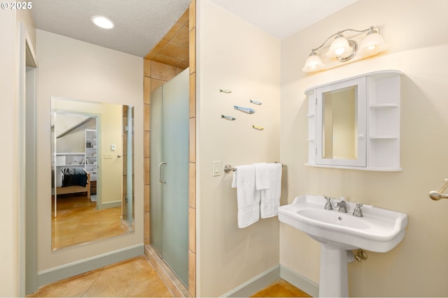 8917 Spindrift Ln, Manzanita, OR 97130 - full bathroom featuring a shower stall and baseboards