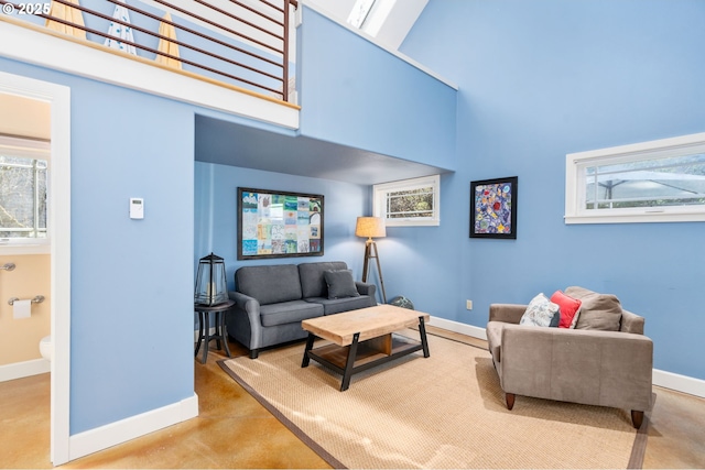 8917 Spindrift Ln, Manzanita, OR 97130 - living area with baseboards and a towering ceiling