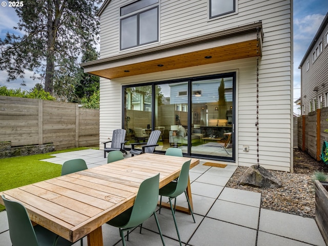 3770 NE 7th Ave, Portland, OR 97212 - fenced backyard featuring a patio area and outdoor dining area
