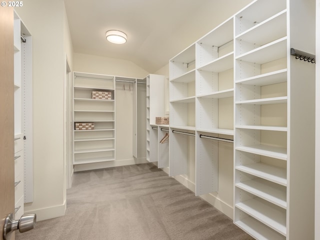 3770 NE 7th Ave, Portland, OR 97212 - spacious closet with light carpet and vaulted ceiling