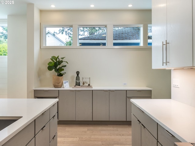 3770 NE 7th Ave, Portland, OR 97212 - kitchen featuring gray cabinets, light wood-style flooring, light countertops, and recessed lighting