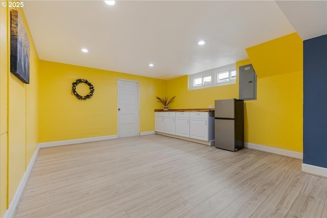 3400 SW 110th Ave, Beaverton, OR 97005 - interior space featuring recessed lighting, baseboards, light wood finished floors, and electric panel