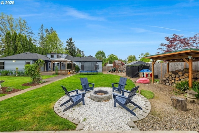 3400 SW 110th Ave, Beaverton, OR 97005 - exterior space featuring fence, a trampoline, a gazebo, an outdoor fire pit, and a playground