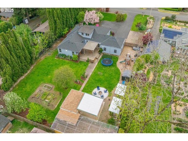 birds eye view of property with a residential view