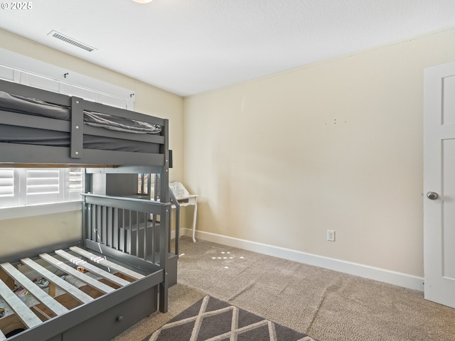 924 Park St, Sweet Home, OR 97386 - bedroom featuring carpet floors, visible vents, and baseboards