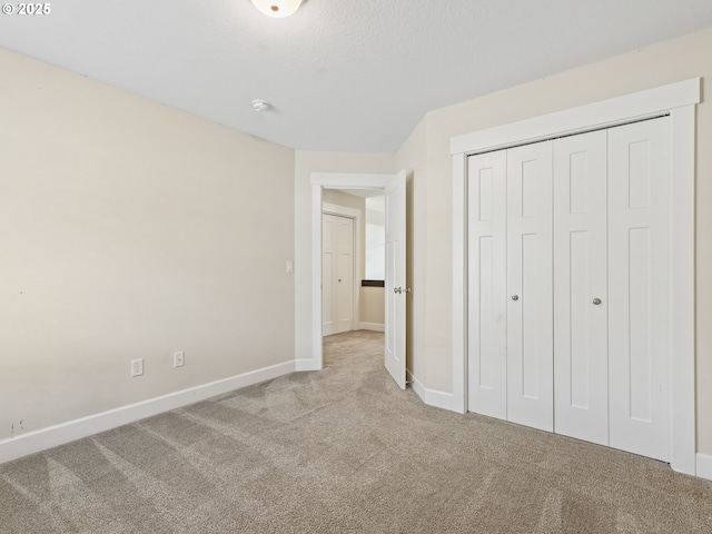 924 Park St, Sweet Home, OR 97386 - unfurnished bedroom with carpet, a closet, and baseboards