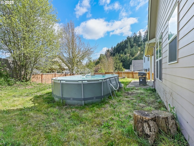 924 Park St, Sweet Home, OR 97386 - view of yard with a fenced in pool and a fenced backyard