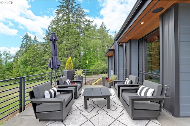11440 NW Rock Creek Rd, Portland, OR 97231 - view of patio / terrace featuring an outdoor hangout area and a balcony