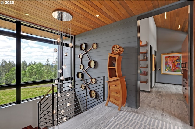 11440 NW Rock Creek Rd, Portland, OR 97231 - exercise room featuring plenty of natural light, wood ceiling, wood finished floors, and recessed lighting
