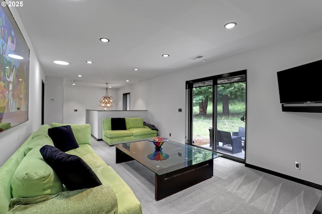 11440 NW Rock Creek Rd, Portland, OR 97231 - living room featuring light colored carpet, a chandelier, recessed lighting, and baseboards
