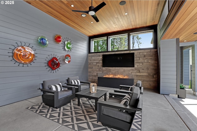 11440 NW Rock Creek Rd, Portland, OR 97231 - view of patio with an outdoor living space with a fireplace and ceiling fan