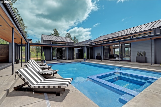 11440 NW Rock Creek Rd, Portland, OR 97231 - view of pool featuring a pool with connected hot tub and a patio area