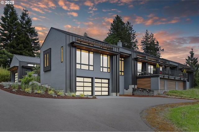 11440 NW Rock Creek Rd, Portland, OR 97231 - contemporary house with a garage and driveway