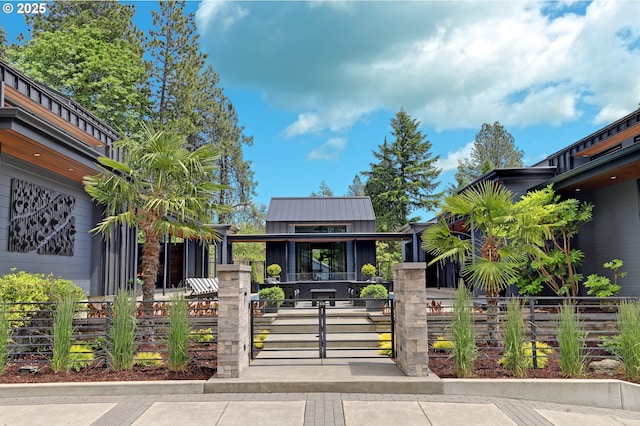 11440 NW Rock Creek Rd, Portland, OR 97231 - view of home's community with a fenced front yard and a gate
