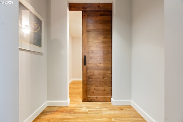 corridor featuring hardwood / wood-style flooring