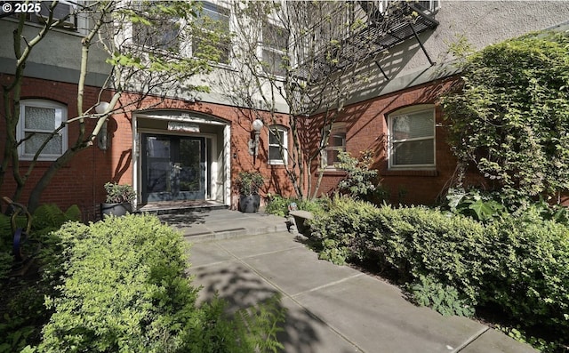 731 SW King Ave, Portland, OR 97205 - entrance to property featuring brick siding and french doors