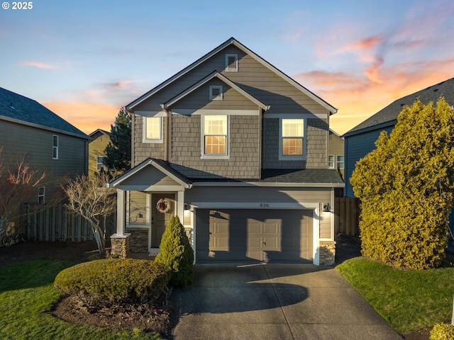 craftsman-style home featuring a garage