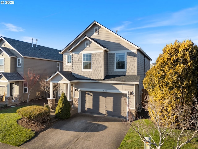 craftsman inspired home featuring a garage