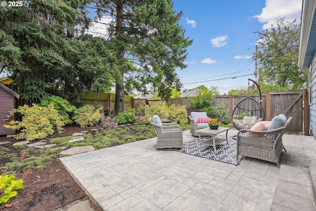 4595 NE 34th Ave, Portland, OR 97211 - fenced backyard with a patio area and an outdoor living space