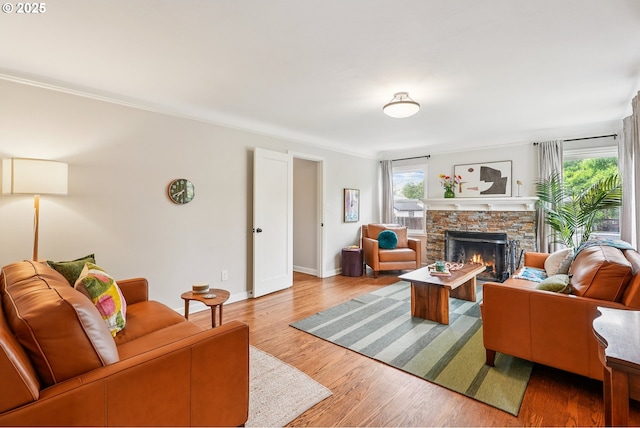 4595 NE 34th Ave, Portland, OR 97211 - living area featuring a fireplace and wood finished floors