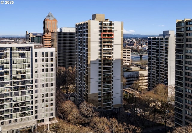 property's view of city with a water view