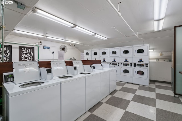 laundry room featuring washer and clothes dryer