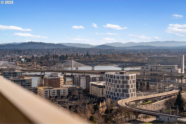 view of city featuring a water and mountain view