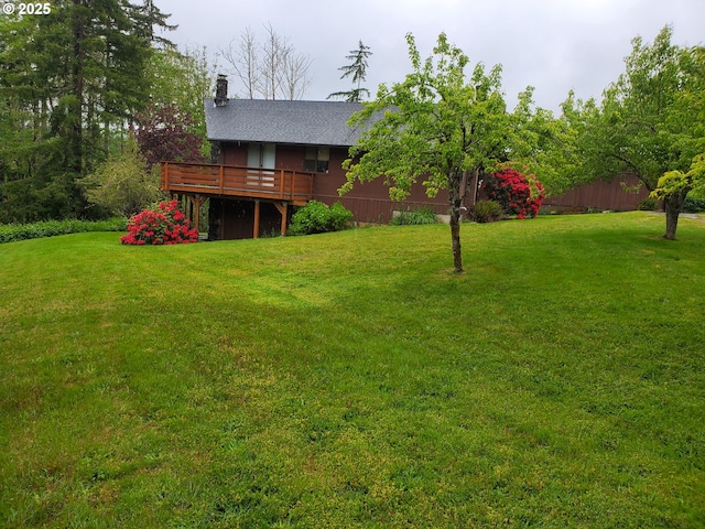 view of yard with a deck