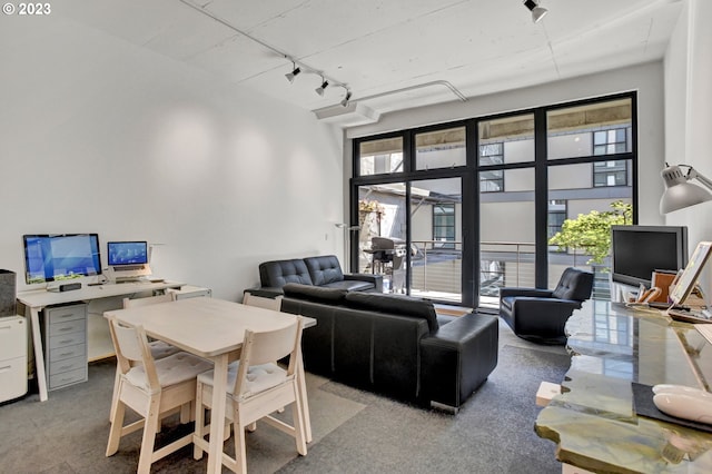 1400 NW Irving St Unit 618, Portland, OR 97209 - living area featuring track lighting, plenty of natural light, and an office area