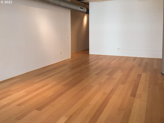 1400 NW Irving St Unit 618, Portland, OR 97209 - unfurnished room with light wood-type flooring