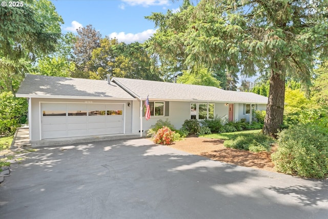 15985 SW Bull Mountain Rd, Tigard, OR 97224 - single story home featuring an attached garage and concrete driveway