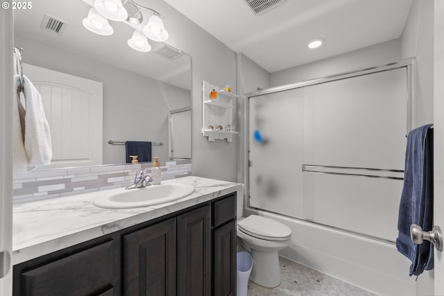 9414 NE 166th Ave, Vancouver, WA 98682 - full bathroom featuring vanity, enclosed tub / shower combo, toilet, and tasteful backsplash