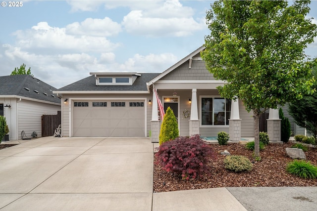 9414 NE 166th Ave, Vancouver, WA 98682 - craftsman inspired home with a porch, a garage, driveway, a shingled roof, and fence