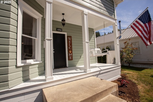 entrance to property with a porch
