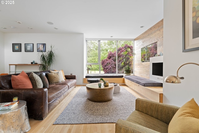 435 N Shaver St, Portland, OR 97227 - living area featuring light wood finished floors and recessed lighting