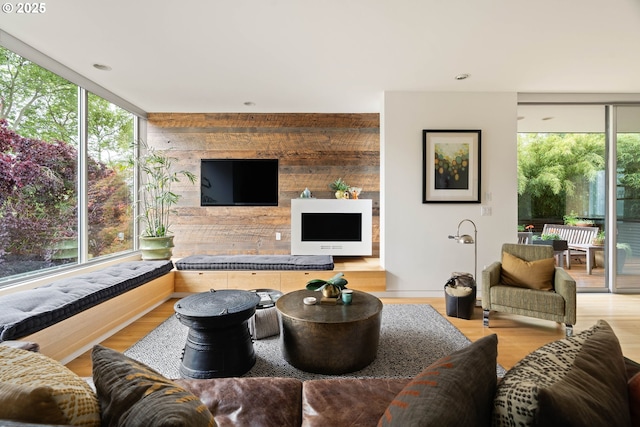 435 N Shaver St, Portland, OR 97227 - living area with wood finished floors and a wall of windows