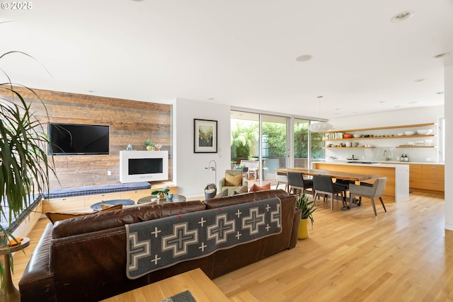 435 N Shaver St, Portland, OR 97227 - living area with light wood-style floors and floor to ceiling windows